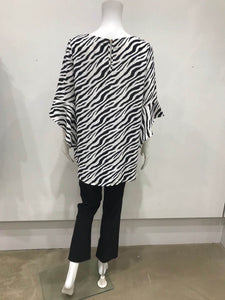 Bell sleeved top