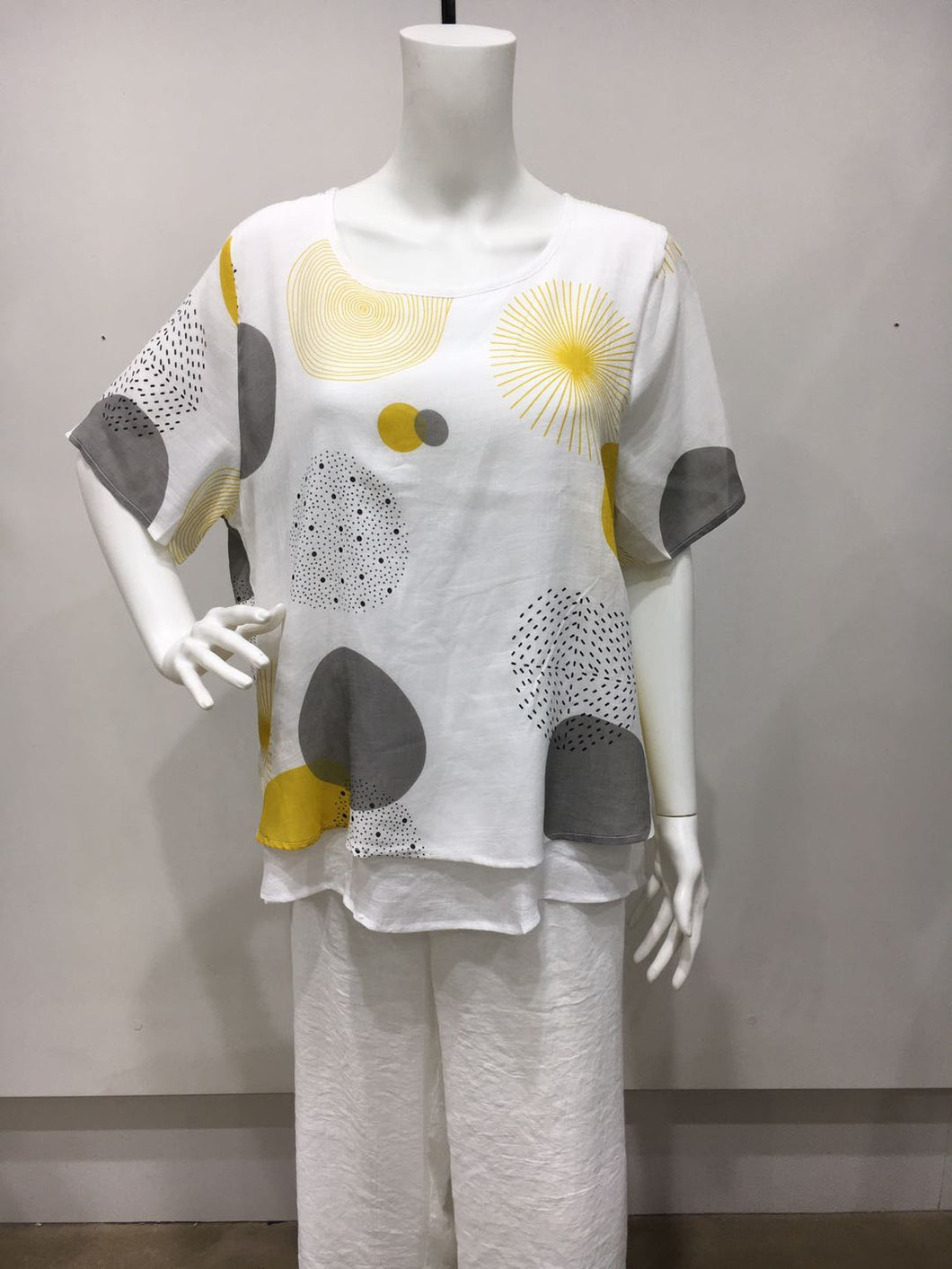 Double layered spotted top