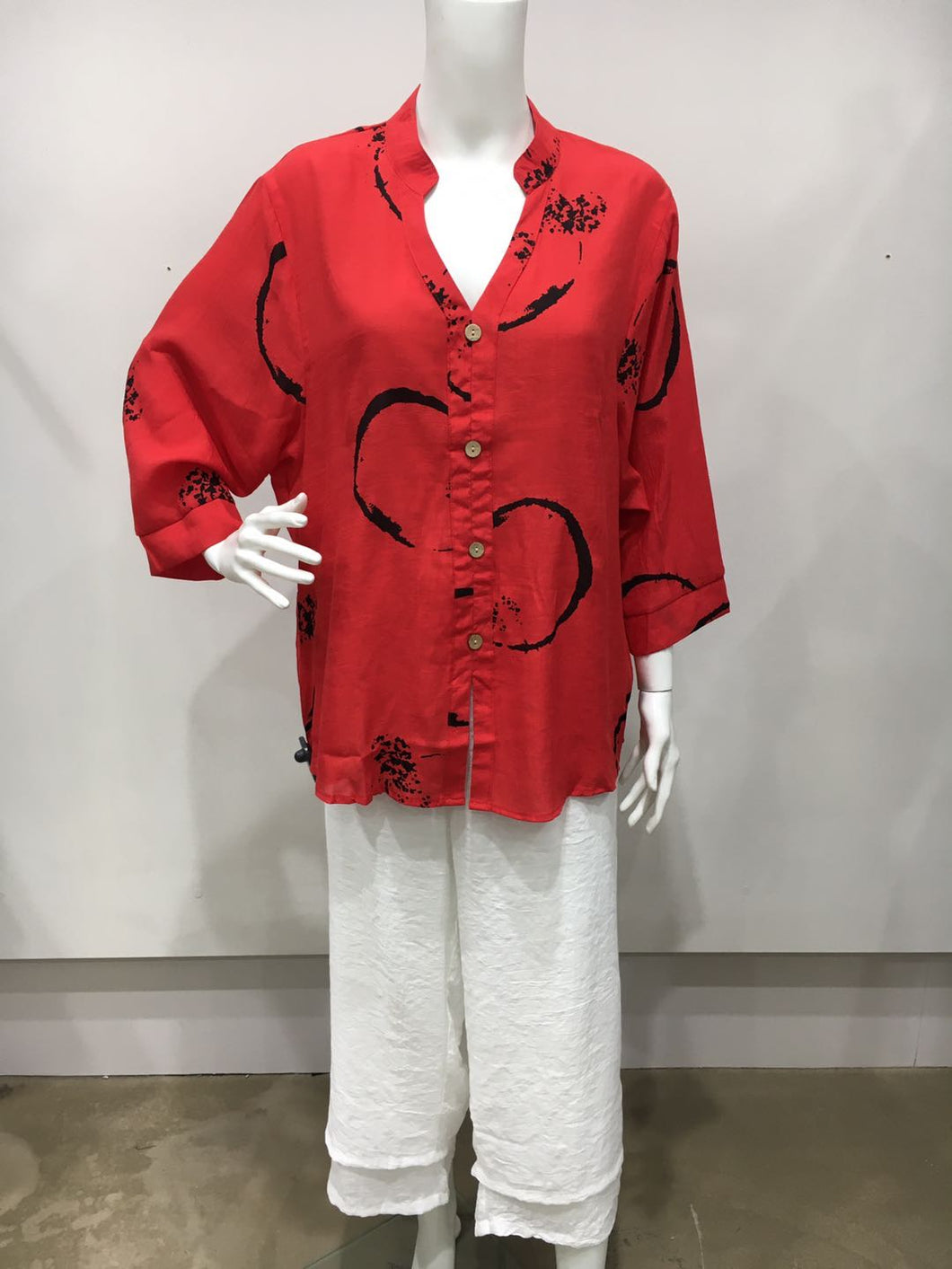 Loose fit button up top